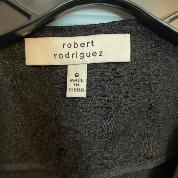 SOLD
Designer Black jacquard fabric textured Mini dress. Size 8 - Picture 4 of 4